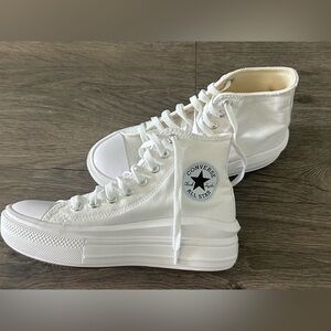 NEVER WORN!  Converse white platform high tops.  Size 7.